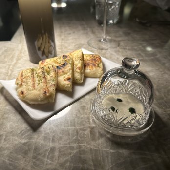 Frevo - shabazi naan, smoked tofu spread, chive oil - French Near Me - New York, New York Frevo - shabazi naan, smoked tofu spread, chive oil - French Near Me - New York, New York