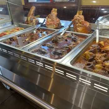 Maikel’s Kitchen - Pork shoulder on display - Latin American Near Me - Tampa, Florida Maikel’s Kitchen - Pork shoulder on display - Latin American Near Me - Tampa, Florida