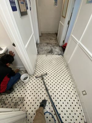 Tile and grout floor restoration - When dealing with a neglected tile and grout floor, it’s important we pay special attention to all the edges and corners that are normally hard to reach for our customers. 
This takes getting down and dirty  with the floor. 

But as you can see in our after picture, the results are amazing