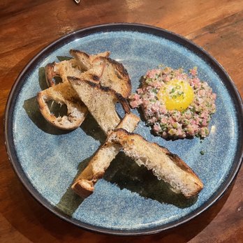 Sparrow + Wolf - 06.13.21 - Grass fed beef tartare, confit egg yolk, grilled sourdough $19 - One of our favorites of the meal - New American Near Me - Las Vegas, Nevada Sparrow + Wolf - 06.13.21 - Grass fed beef tartare, confit egg yolk, grilled sourdough $19 - One of our favorites of the meal - New American Near Me - Las Vegas, Nevada