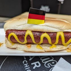 Gutenburg - Junior Hot Dog: buy one. Small appetites still deserve big flavor! Love the crispy potato sticks in this perfect bite.