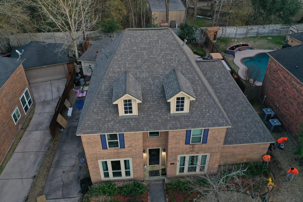 Slide of Storm Guard Roofing of Spring