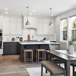 Chris Budka Real Estate - Beautiful Boise kitchen with Bosch appliances, modern finishes, and ample storage.