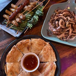 Scallion Pancake, enoki mushroom, chives, Korean rice cake, sausage, green beans, fried calamari/squid tentacles