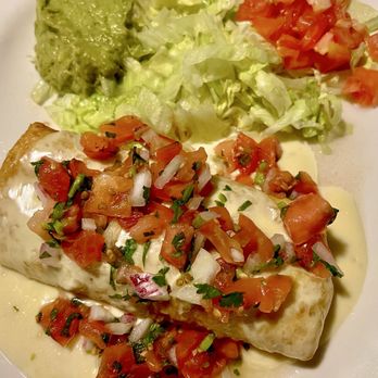 Don Ramon - Big Chimichanga with chicken and pico de gallo and guacamole salad. - Mexican Near Me - Forest City, North Carolina