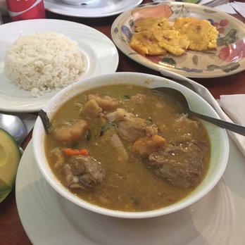 Punta Cana Restaurant - Sancocho con arroz blanco y aguacate, tostones as well - Dominican Near Me - Chicago, Illinois Punta Cana Restaurant - Sancocho con arroz blanco y aguacate, tostones as well - Dominican Near Me - Chicago, Illinois