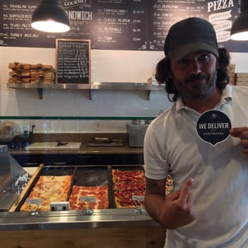 ZeroZero39 Pizzeria - Francesco has SUCH attention to detail. Warmed&served on a cutting board. Now that they deliver thru POSTMATES, life complete! - Pizza Near Me - Huntington Beach, California