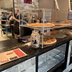 La Famiglia Pizza - By the slice ready and waiting.