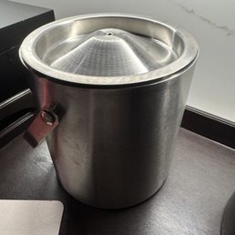 Ice delivered to our room in ice bucket missing lid handle almost impossible to get open Ice delivered to our room in ice bucket missing lid handle almost impossible to get open