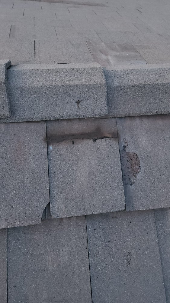 Slide of Rescue Roofing Construction