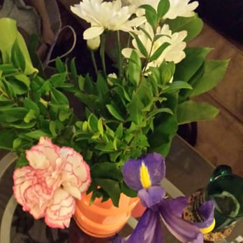 Brothers Papadopoulos - 1 carnation, 1 stem pompoms, 1 blown iris, lots of Greens = CHEAP poor quality flowers - Florists Near Me - San Francisco, California Brothers Papadopoulos - 1 carnation, 1 stem pompoms, 1 blown iris, lots of Greens = CHEAP poor quality flowers - Florists Near Me - San Francisco, California