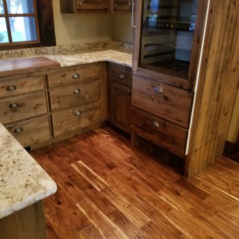 Allay Mitigation Services - Completed kitchen after water damages. New flooring, painted cabinets and paint. All work done in-house. - Damage Restoration Near Me - Nampa, Idaho