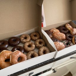 two boxes of doughnuts
