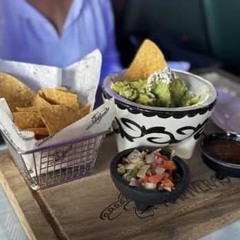 Kalaveras - Chips and guac - underwhelming lacked flavor and pico de gallo tasted old and unappetizing. Too bad looked good. - Cocktail Bars Near Me - Escondido, California Kalaveras - Chips and guac - underwhelming lacked flavor and pico de gallo tasted old and unappetizing. Too bad looked good. - Cocktail Bars Near Me - Escondido, California