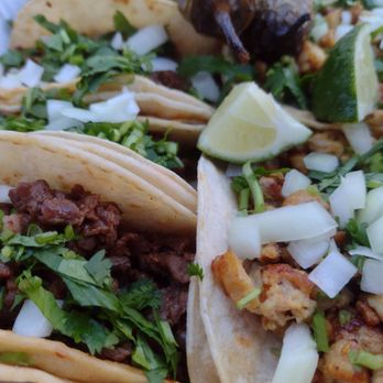 Angel's Mexican food - Asada and chicken tacos with the cilantro and onions on top. - Food Trucks Near Me - Shelton, Washington