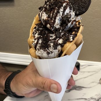 Sweet Snow - Bubble waffle cone with cookies n cream ice cream, Nutella filling, chocolate drizzle and Oreo topping - Ice Cream & Frozen Yogurt Near Me - Goodyear, Arizona Sweet Snow - Bubble waffle cone with cookies n cream ice cream, Nutella filling, chocolate drizzle and Oreo topping - Ice Cream & Frozen Yogurt Near Me - Goodyear, Arizona