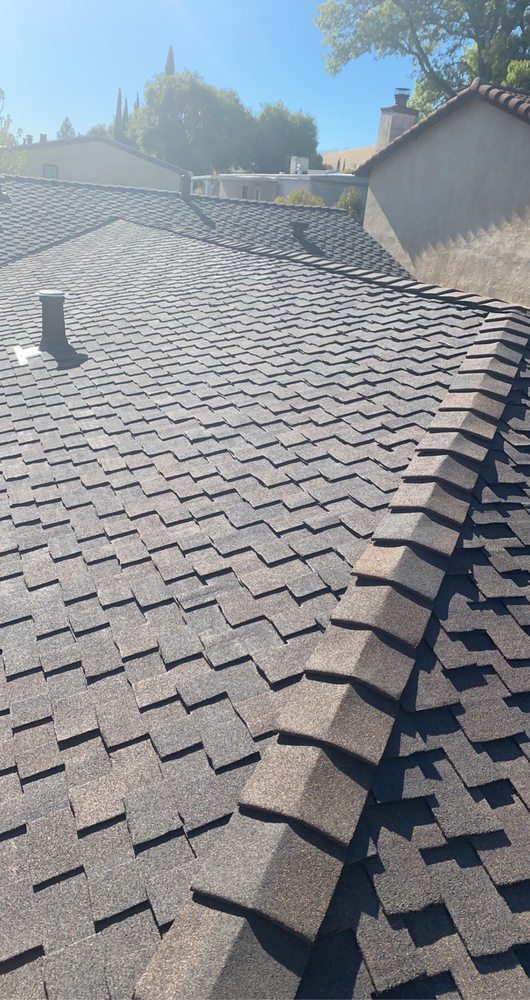 Slide of Aguilar Roofing