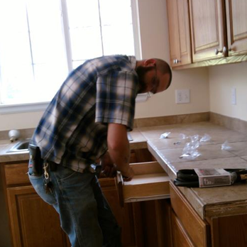 Ram Home Improvements - a man working in a kitchen - General Contractors Near Me - Lakewood, Colorado Ram Home Improvements - a man working in a kitchen - General Contractors Near Me - Lakewood, Colorado