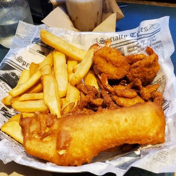 Nicki's Bella Marina - Half of a two piece fish with clam strips and shrimp. - Fish & Chips Near Me - Bellingham, Washington Nicki's Bella Marina - Half of a two piece fish with clam strips and shrimp. - Fish & Chips Near Me - Bellingham, Washington