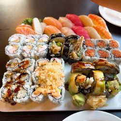 Pier 99 - Salmon, white tuna sashimi, yellowtail, tuna, white tuna, shrimp sushi.  Baltimore, spider, spicy tuna, eel, old bay, dragon