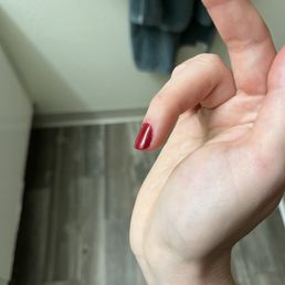 Dent in nail because of thick layers of polish which wouldn't dry