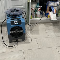 Blue Ribbon Restoration Consultancy - Drying a kitchen after water leak