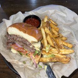 Tavern 24 - Double smash burger with pepper, jack cheese, and Cajun style fries