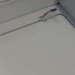 This is their little ghetto rig to make the machine work. If it's broken, put an out of order sign on it. This is ridiculous!