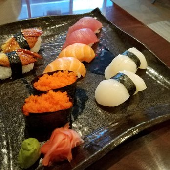 Misako - Scallop (right) $4, Masago (bottom) $3, Salmon (center) $2, Tuna (top) $2, Eel (left) $3.  Scallops are amazing. - Ramen Near Me - Virginia Beach, Virginia