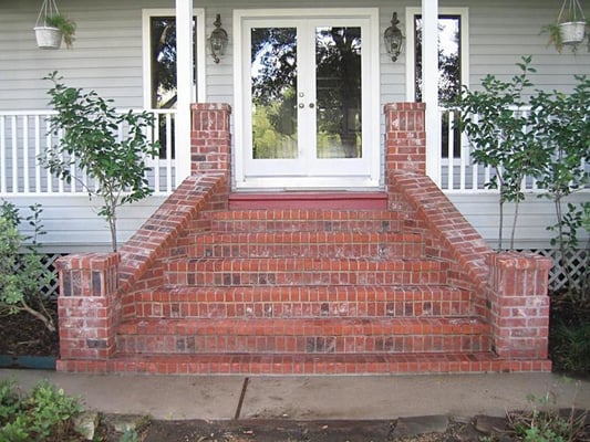 Pressure washing flat surface with low pressure and a chemical retardant - 10 years wiped away gently with low pressure