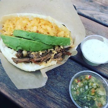 Pico Arepa - a close up of a sandwich - Food Trucks Near Me