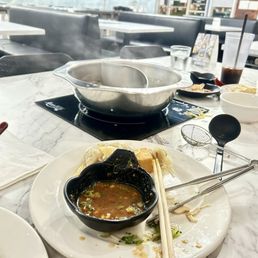 Self made sauce from sauce bar and our ying yang broths Self made sauce from sauce bar and our ying yang broths
