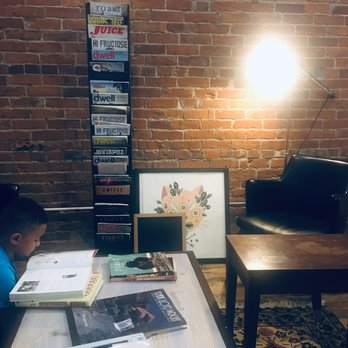 Black Rabbit Coffee - a young boy reading a book - Coffee Roasteries Near Me - Hillsboro, Illinois Black Rabbit Coffee - a young boy reading a book - Coffee Roasteries Near Me - Hillsboro, Illinois