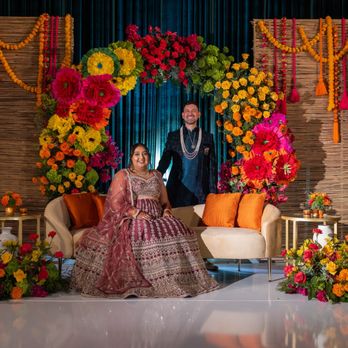 Ethnic Essence Inc. - Happy couple on-stage for the Reception - Wedding Planning Near Me - Anaheim, California