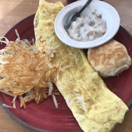 3 egg omelet, hash browns , biscuit with a small side of gravy. Decent. 3 egg omelet, hash browns , biscuit with a small side of gravy. Decent.
