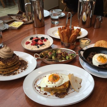 Blue Duck Tavern - Open faced breakfast sandwich (front), clockwise: pumpkin pancakes, muesli, brussell sprouts, thick cut fries, short rib hash) - New American Near Me - Washington, DC, District of Columbia