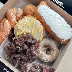 Donna's Donuts - Twist, filled banana, chocolate moon rock, coconut cream, blueberry glazed