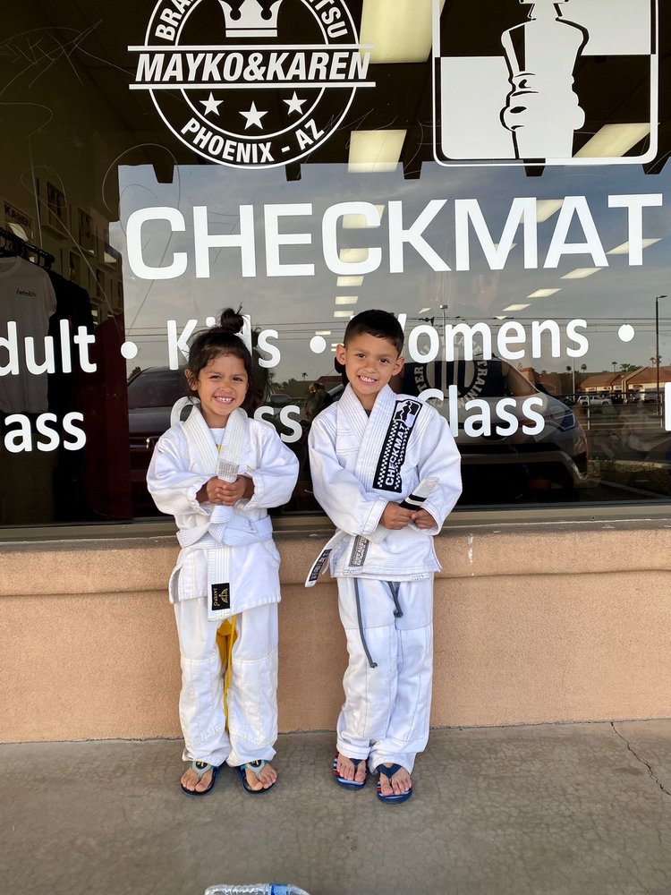 Checkmat Phoenix - Mayko & Karen Logo