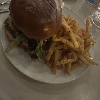 Heights & Co - Grilled chicken pesto sandwich w/ fries - Cocktail Bars Near Me - Houston, Texas