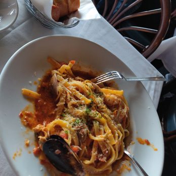 Nick's Seafood Restaurant - Fettuccine seafood feast. 2 mussels 2clams 2 ocean scallops and 3 shrimps.....spicy marinara - Seafood Near Me - Pacifica, California
