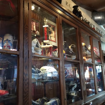 Trainwreck Saloon - Display wall with many sports-related awards and memorabilia - Sports Bars Near Me - Saint Louis, Missouri Trainwreck Saloon - Display wall with many sports-related awards and memorabilia - Sports Bars Near Me - Saint Louis, Missouri