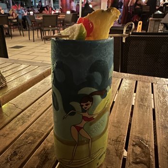 Tikis Grill & Bar - Hula Girl Mai Tai w/ Souv. Gls - Seafood Near Me - Honolulu, Hawaii Tikis Grill & Bar - Hula Girl Mai Tai w/ Souv. Gls - Seafood Near Me - Honolulu, Hawaii