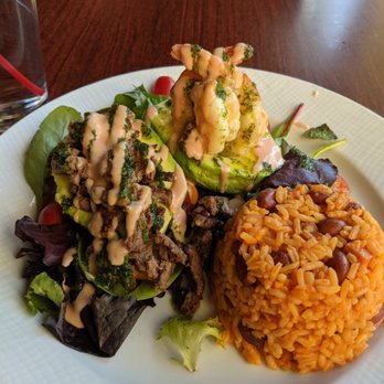 Sabor Tropical Restaurant and Lounge - Avocado dish with steak, shrimp and Puerto Rican rice - Latin American Near Me - Milwaukee, Wisconsin Sabor Tropical Restaurant and Lounge - Avocado dish with steak, shrimp and Puerto Rican rice - Latin American Near Me - Milwaukee, Wisconsin