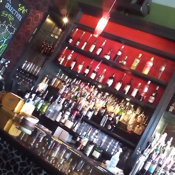 Jaragua - Bar was a lot longer and bigger, just took a picture of the side and sideways. Gives a different look. Full bar! - Salvadoran Near Me - Los Angeles, California