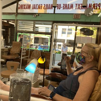 Top Nails By Ana - Natural light from the glass storefront looking toward the Yoga Room and 12th Ave Grill - Nail Salons Near Me - Honolulu, Hawaii