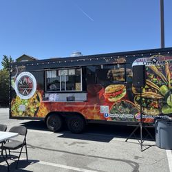 Sabor En La Calle - At the summit Home Depot  Feeding the chore chore people.
