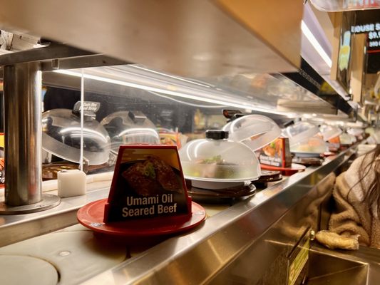 Kura Revolving Sushi Bar by null