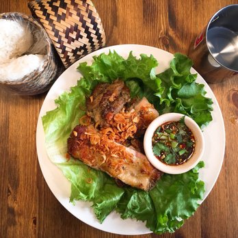 Hug Esan - Grilled chicken with sticky rice - Thai Near Me - Elmhurst, New York Hug Esan - Grilled chicken with sticky rice - Thai Near Me - Elmhurst, New York