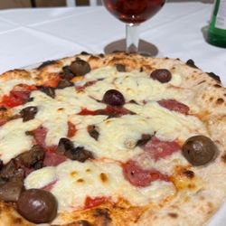Trattoria Pizzeria Marechiaro - Pizza with mushrooms and olives and a drought red beer
