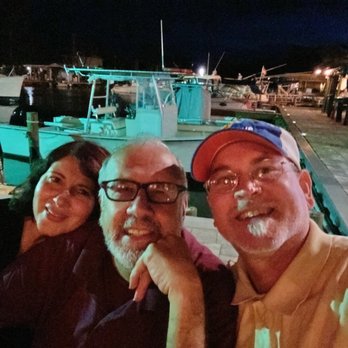 Outriggers Bar and Grill - Us at our table next to marina - Bars Near Me - Micco, Florida Outriggers Bar and Grill - Us at our table next to marina - Bars Near Me - Micco, Florida